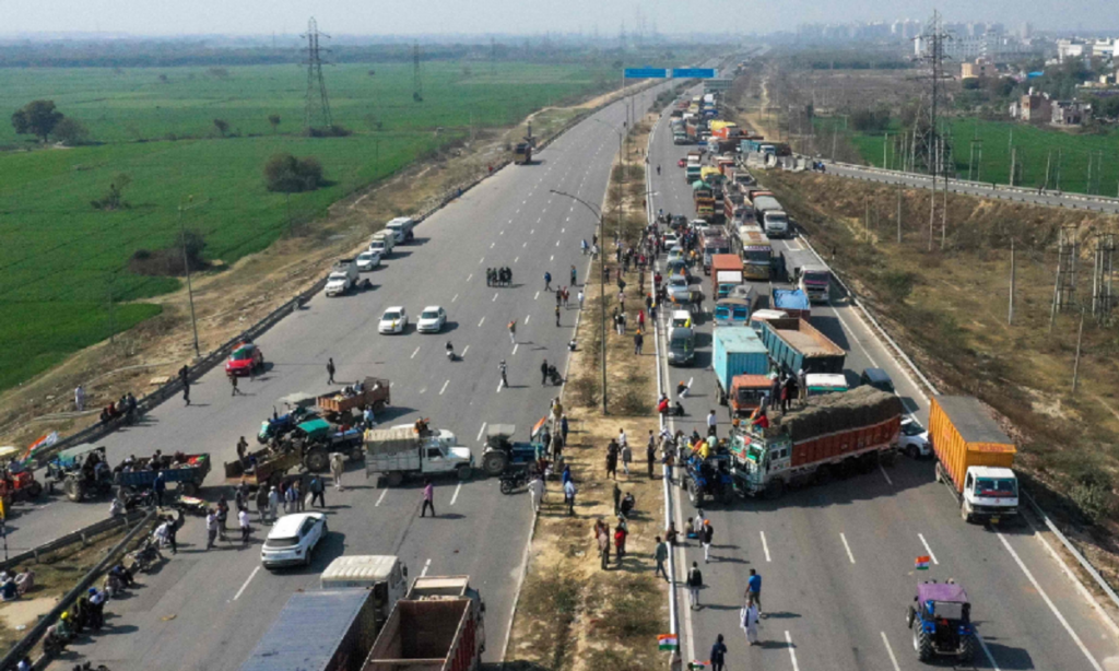 farmers block roads in India with tractors, trucks