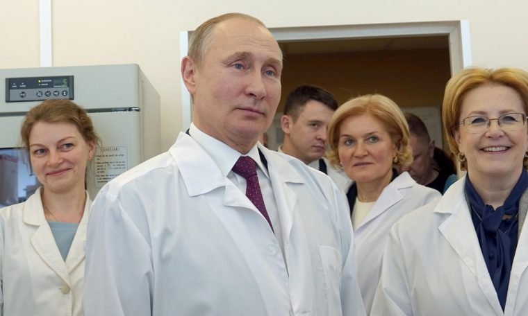 Putin says he opposes mandatory Covid vaccinations