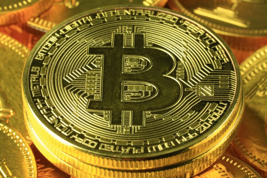 Bitcoin dips below $100,000 as risk-off sentiment drives global stock sell-off and dollar climbs to four-month high
