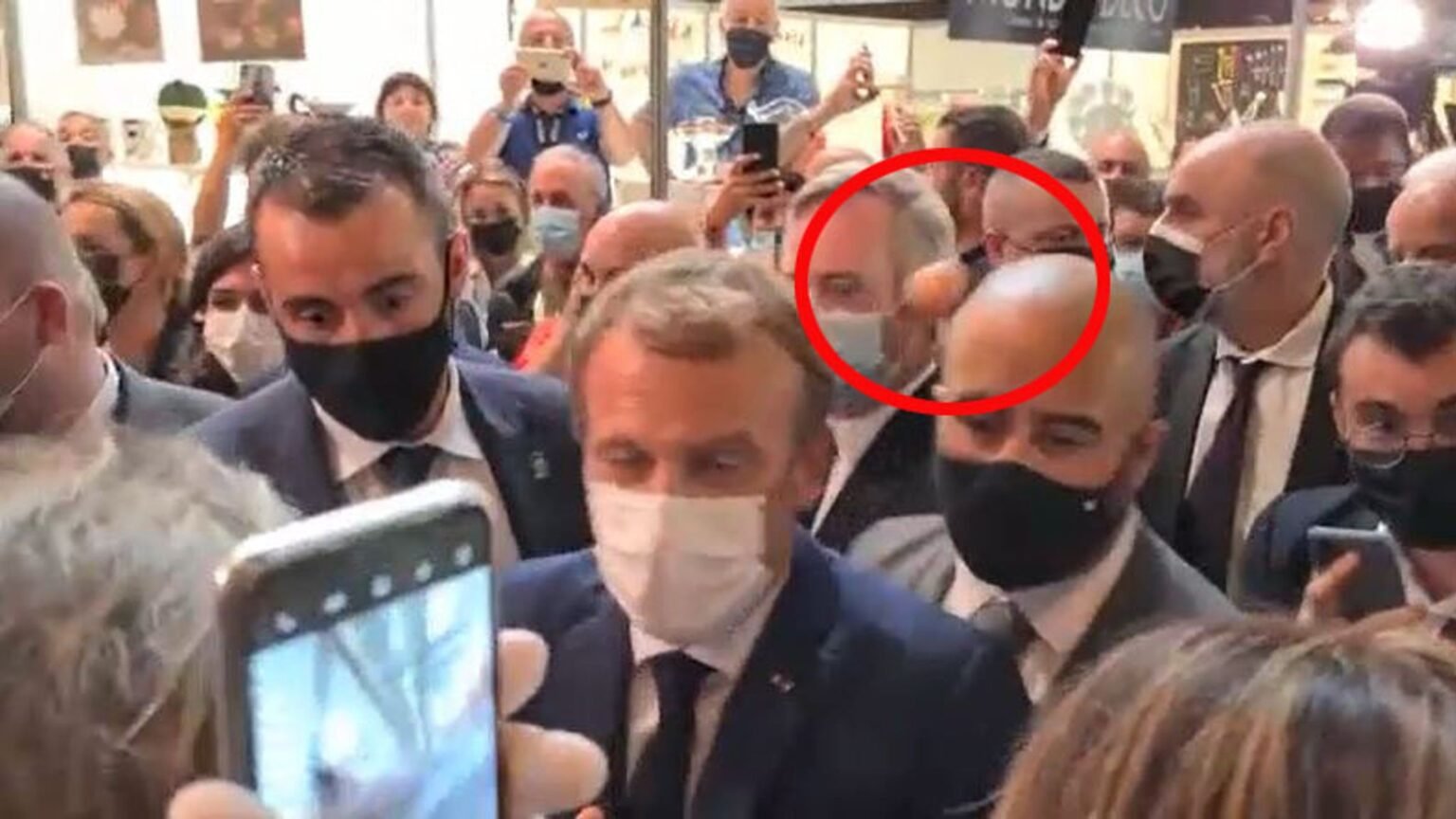 Macron hit with egg during visit to trade fair