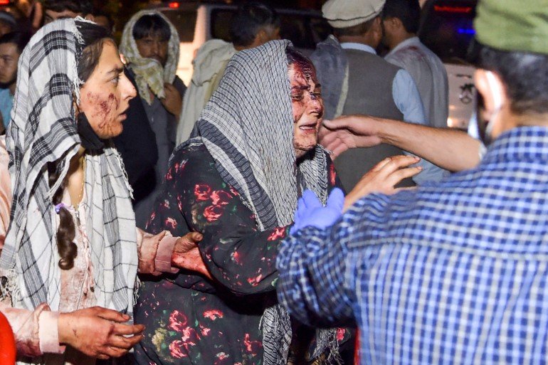 Over 110 killed in two blasts outside Kabul Airport