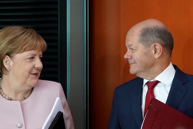 new german chancellor scholz assumes charge marking end to merkel’s era