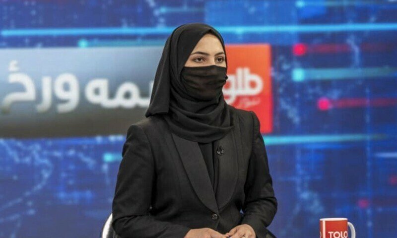 Afghan TV presenters cover faces on television