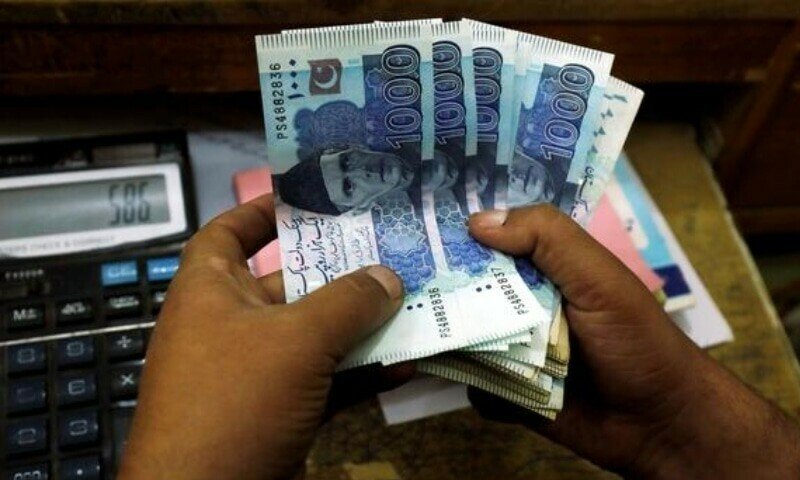 PKR slides to an all-time low against dollar after falling 84 paise in interbank