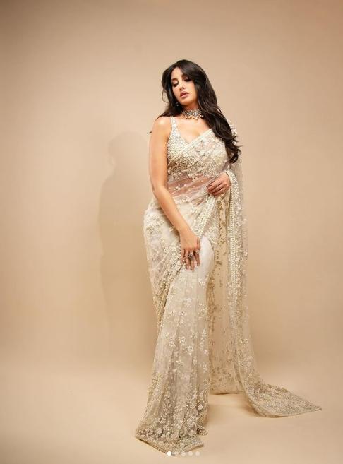 Nora Fatehi Stuns in Glamorous Saree, Sets Social Media Ablaze with Latest Snaps