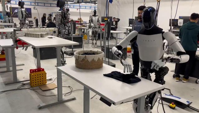 Tesla’s Shirt-Folding Robot Unveiled by Elon Musk Raises Concerns About Job Displacement