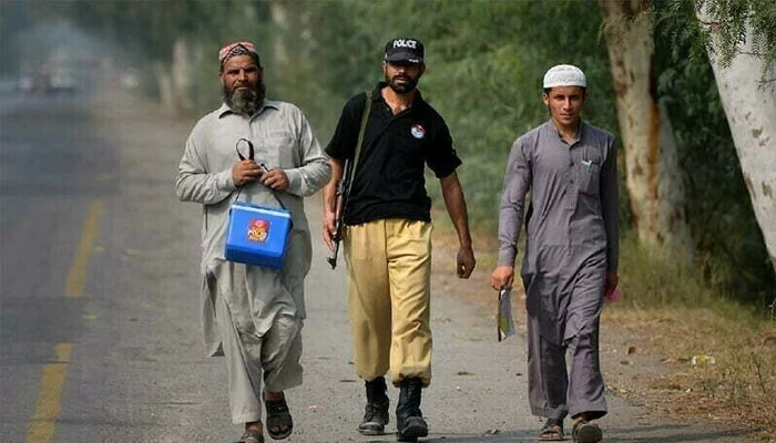 Two policemen were killed in KP when gunmen attacked polio vaccination teams