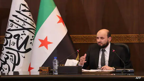 New Syria PM Vows to ‘Guarantee’ Rights of All Religious Groups