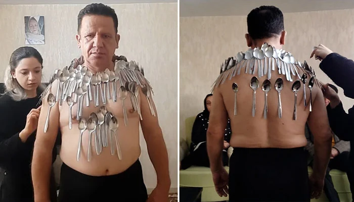 Mokhtari broke his own Guinness World Records by balancing 96 spoons on his body