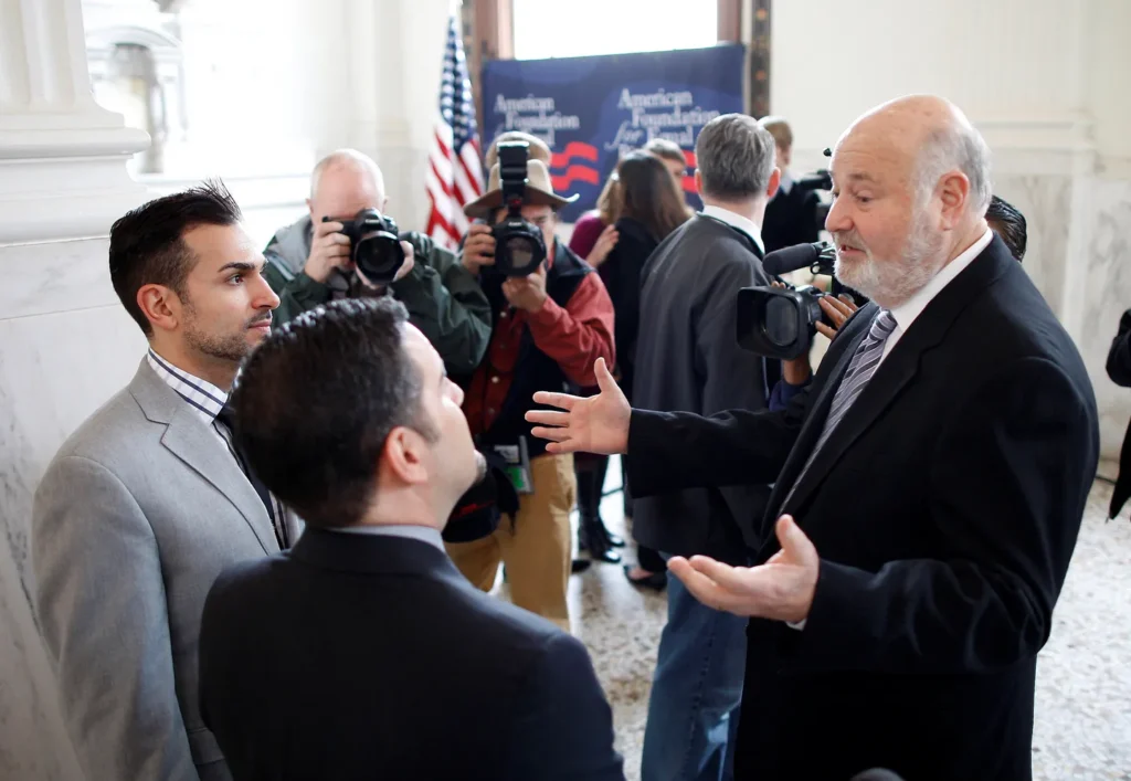 Rob Reiner’s son enters police custody after the filmmaker and his wife are found dead, as tributes and investigation continue.